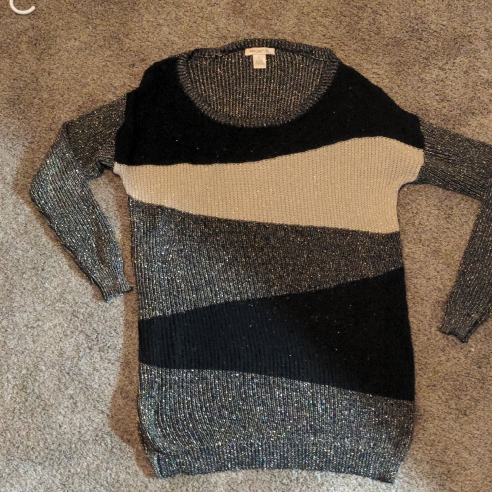 Sparkly long sweater.  Black, cream, and gold.